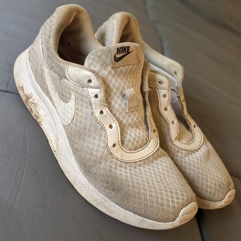 Well worn athletic shoes
